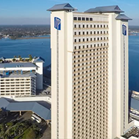 Exterior view of IP Casino Resort Spa in Biloxi featuring the resort hotel tower and waterfront location highlighting a premier casino hotel spa and entertainment destination on the Mississippi Gulf Coast.